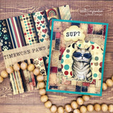 Teal-framed collage card with the cat in glasses over patterned papers and a 'Sup?' banner.