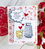 Valentine card on red heart papers with a thought bubble reading 'THIS MIGHT SOUND CHEESY... BUT I THINK YOU'RE GRATE,' beside red heart accents.