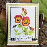 Yellow scalloped card with flame-orange pansies. So appreciated banner.