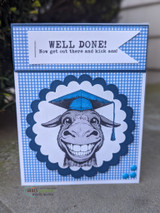 Handmade card featuring the grinning donkey wearing a graduation cap, in a scalloped blue circle frame, stamped with 'Congratulations, smarty pants'.