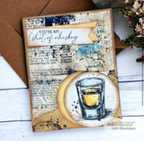 Mixed-media card with a shot glass on a circle over text-print background, 'You're my shot of whiskey.'