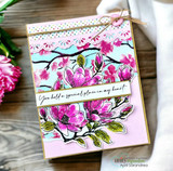 Lisa Arana's blooming magnolia branch with 'You hold a special place in my heart,' an elegant red rubber floral stamp shown on a card.