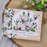 Lisa Arana's blooming magnolia branch with 'You hold a special place in my heart,' an elegant red rubber floral stamp shown on a card.