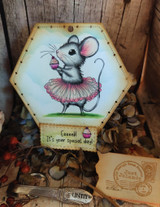 A cute mouse in a tutu holding a cupcake stamped in red rubber and colored on a handmade card reading "You just get sweeter and sweeter."