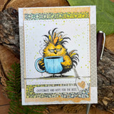 Rustic card with the yellow rooster holding a blue coffee mug, captioned 'Caffeinate and hope for the best.'