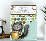 A handmade card featuring a scruffy, grumpy cat hugging a big coffee mug from Unity Stamp Co's Pissy Kitty red rubber stamp set, with the sentiment 'Coffee, because I can't wear prison orange'.