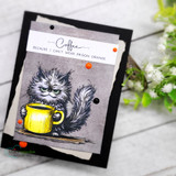 A cardmaking project featuring a scruffy, grumpy cat hugging a big coffee mug from Unity Stamp Co's Pissy Kitty red rubber stamp set, with the sentiment 'Before coffee I hate everyone, after coffee I feel better about hating everyone'.