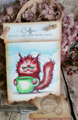 A colored card featuring a scruffy, grumpy cat hugging a big coffee mug from Unity Stamp Co's Pissy Kitty red rubber stamp set, with the sentiment 'Before coffee I hate everyone, after coffee I feel better about hating everyone'.