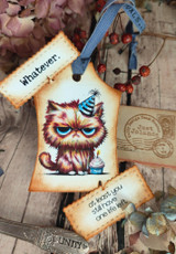 Gift tag featuring the grumpy party cat with the sentiments 'Whatever' and 'at least you still have one life left.'