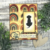 Handmade card framed with a large scalloped rectangle die cut.