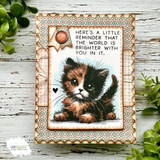 Handmade card framed with a large scalloped rectangle die cut.