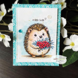 Turquoise floral card of the hedgehog with red blooms, 'a little hello'