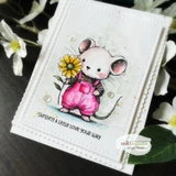 Handmade card featuring a cute mouse in overalls holding a flower, with the sentiment "You make everything bloom."