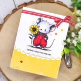 A card project showing a cute mouse in overalls holding a flower, paired with the greeting "You make everything bloom."