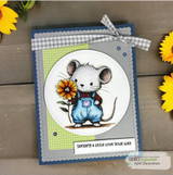 A cute mouse in overalls holding a flower stamped in red rubber and colored on a handmade card reading "Sending a little love your way."