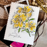 Angie Blom's cluster of tiger lilies with 'With sympathy,' a comforting red rubber floral stamp shown on a handmade sympathy card.