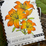 Angie Blom's cluster of tiger lilies with 'With sympathy,' a comforting red rubber floral stamp shown on a handmade sympathy card.
