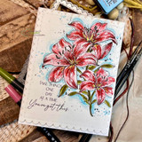 Angie Blom's cluster of tiger lilies with 'With sympathy,' a comforting red rubber floral stamp shown on a handmade sympathy card.