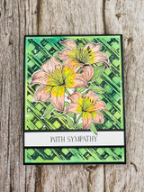 Angie Blom's cluster of tiger lilies with 'With sympathy,' a comforting red rubber floral stamp shown on a handmade sympathy card.