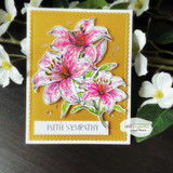 Angie Blom's cluster of tiger lilies with 'With sympathy,' a comforting red rubber floral stamp shown on a handmade sympathy card.
