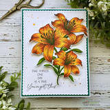Angie Blom's cluster of tiger lilies with 'With sympathy,' a comforting red rubber floral stamp shown on a handmade sympathy card.