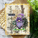 Card of the purple-hatted gnome over botanical papers, 'thank you.'