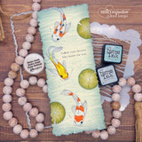 Slimline card with koi swimming beside 'Follow your dreams. They know the way'.