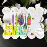 Scalloped birthday card with four brightly colored fishing lures and a 'happy birthday' die-cut