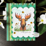 Green scalloped card with the moose in wildflowers, gold accents
