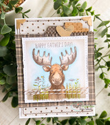 Card with the colored moose in wildflowers and "Happy Father's Day!" sentiment, plaid background