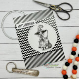Card with a sketched witch on black chevron paper and "Happy Halloween"