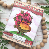 Pink watercolor card of the flower-crowned hen in glasses with 'feeling clucky to have you in my life'