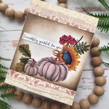 Handmade card made with Unity Stamp Co’s Incredibly Grateful red rubber stamp set — an autumn arrangement of pumpkins, a sunflower, berries and fall leaves — stamped and colored, with the sentiment “Incredibly grateful for you”.