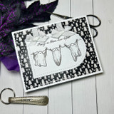 Handmade Halloween card layered with Haunted Hues papers.