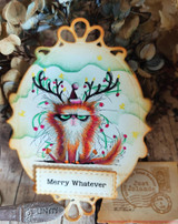 Ornament-shaped card with the grumpy cat colored in red and green with glowing antler string lights and the 'Merry Whatever' sentiment.