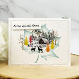 Card with the mountain cabin scene in a leaf window and a 'home sweet home' banner.