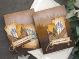 Two moody brown cards with stamped pines, moon, and 'warm wishes' tags.