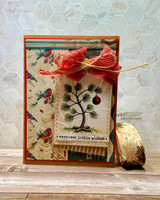 Card with the pine tree and a red bow on patterned paper, captioned 'merriest little wishes.'