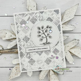 Handmade card with the little pine tree on a white lace-patterned panel, captioned 'merriest little wishes.'