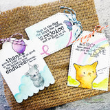 Two tags with 'give thanks to the Lord' and 'This is the day the Lord has made,' with a watercolored cat and koala.