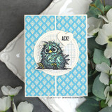 Blue argyle card with the wide-eyed owl in a circle and an "ACK!" speech bubble