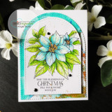 Arched teal card with a blue-green poinsettia over the blessings-of-Christmas sentiment, styled with white blossoms.