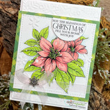 Embossed white card with green patterned layers: a pink poinsettia beside a circle sentiment reading “MAY THE BLESSINGS OF CHRISTMAS FILL YOUR HOME WITH JOY.”