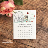 Desk calendar card with the girl and elephant, stamped 'gentle strength.'
