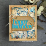 Handmade 'happy birthday' card using the Steampunk Fairyland papers — blue roses layered on a kraft steampunk background.