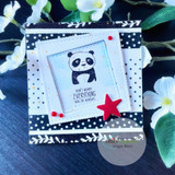Handmade card featuring the cuddly panda holding a red heart, on navy polka-dot paper with a red star, stamped with 'Don't worry, everything will be alright'.