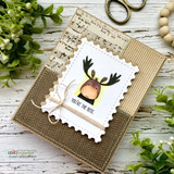 A cheerful cartoon moose with 'you're the best,' a petite itty bitty red rubber stamp shown on a handmade card.