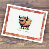 Brown yak with 'you're moo-velous' on a red bandana-print card.