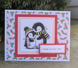 Holly-print card with scarf-wrapped penguins — always by your side