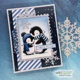 Silver snowflake-framed navy card with the cuddling penguin pair